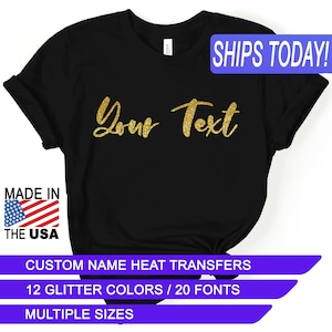 May include: Black t-shirt with gold glitter text that says "Your Text". The shirt is made in the USA and has custom name heat transfers, 12 glitter colors, 20 fonts, and multiple sizes.
