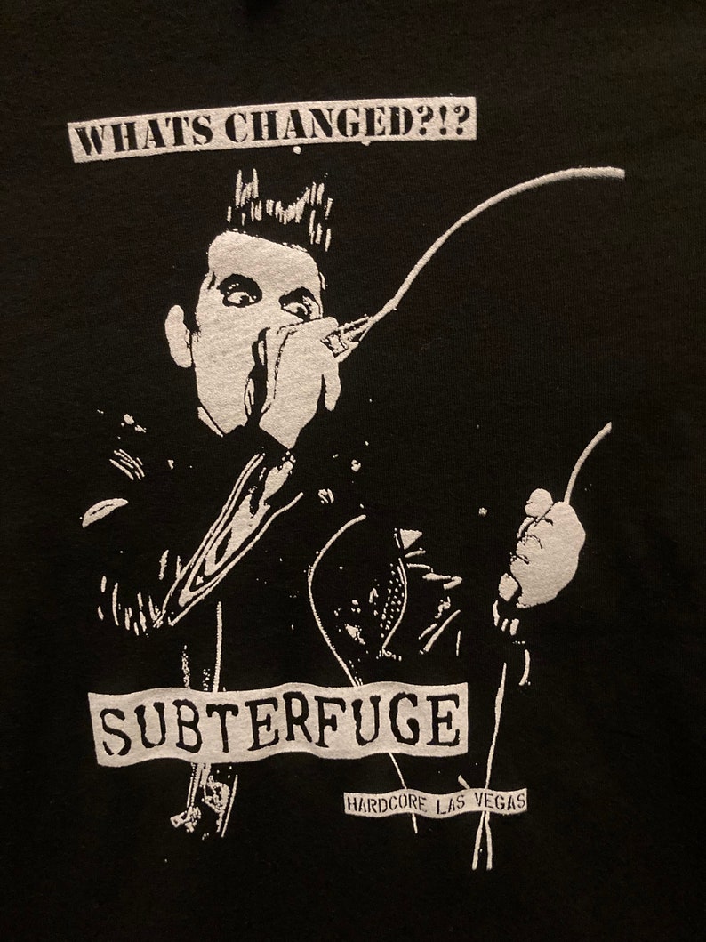 The Subterfuge Whats Changed black Tshirt image 1