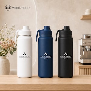 May include: Three cylindrical water bottles in white, navy blue, and black, each featuring a matching screw-top lid with a carry handle and the printed text "YOUR LOGO HERE" on the front. The bottles have a smooth, matte finish.