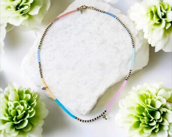 Asymmetrical seed bead necklace: minimalist necklace, dainty beaded necklace with tiny charms, hand beaded necklace on fine silk cord