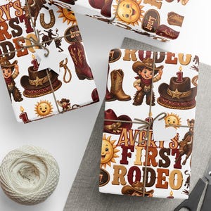 May include: Three wrapped gifts with a cowboy theme. The wrapping paper features illustrations of cowboy hats, boots, a smiling sun, and the text "Every First Rodeo". The gifts are tied with twine and have white tags.