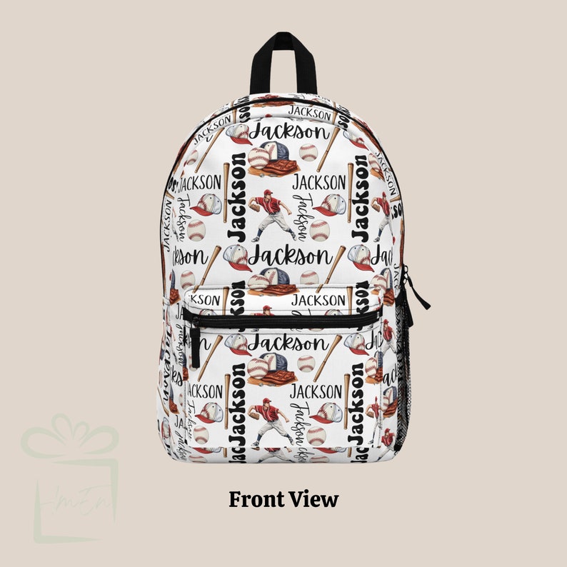 May include: White backpack with a baseball theme. The backpack is covered in a repeating pattern of baseball bats, baseballs, baseball caps, and the name "Jackson".