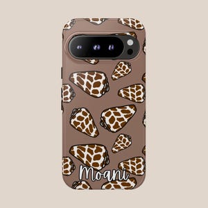 May include: A brown phone case featuring a pattern of brown and white seashell illustrations. The case has a camera cutout and the word "Moani" in white script at the bottom.