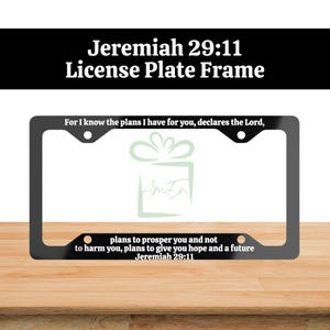 May include: Black license plate frame with the text "Jeremiah 29:11" and the quote "For I know the plans I have for you, declares the Lord, plans to prosper you and not to harm you, plans to give you hope and a future. Jeremiah 29:11".