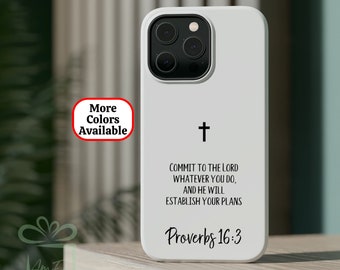 May include: White iPhone case with a black cross and the text "Commit to the Lord whatever you do, and he will establish your plans Proverbs 16:3".