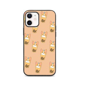 May include: A black phone case with a peach background and a repeating pattern of cartoon corgis holding cups of bubble tea.
