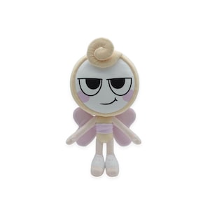 May include: A soft toy doll with a round head, black eyes, and a smiling mouth. It has light pink wings and a light tan body. The doll's hair is styled in a swirl, and it wears white shoes.