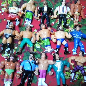 Lote de 7 figuras de colección WWF WWE Titan Wrestling Ring y 7 figuras