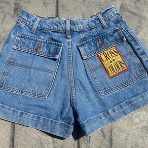 Vintage 90s Cross Colours high rise denim cuffed shorts logo patch button fly throwback streetwear 11/12 29” waist