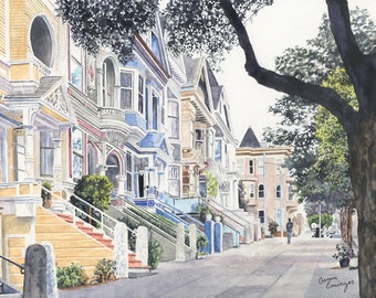 May include: A watercolor painting of a row of colorful Victorian houses with a tree in the foreground. The houses are painted in shades of blue, yellow, and pink, and they have intricate details, such as balconies and bay windows. The tree is in the foreground, and its branches extend over the houses. The painting is signed by the artist, Aaron Emminger.