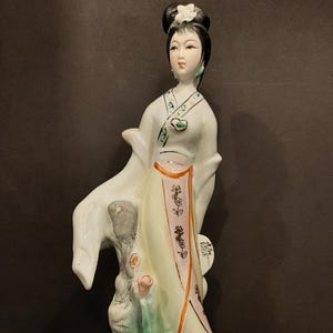 Vintage Collection Chinese Hand Painted Porcelain Figurine Geisha with Lotus Flowers Signed Circa Second Half 20th Century