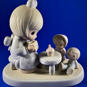 Precious Moments Figurine “May Your Birthday Be A Blessing”