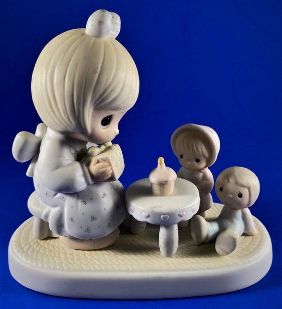 Precious Moments Figurine “May Your Birthday Be A Blessing”