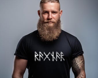 May include: A black short-sleeved t-shirt featuring a white graphic print of runic characters across the chest. The design has a distressed, weathered texture. The shirt has a crew neckline and rolled sleeves, providing a casual appearance.