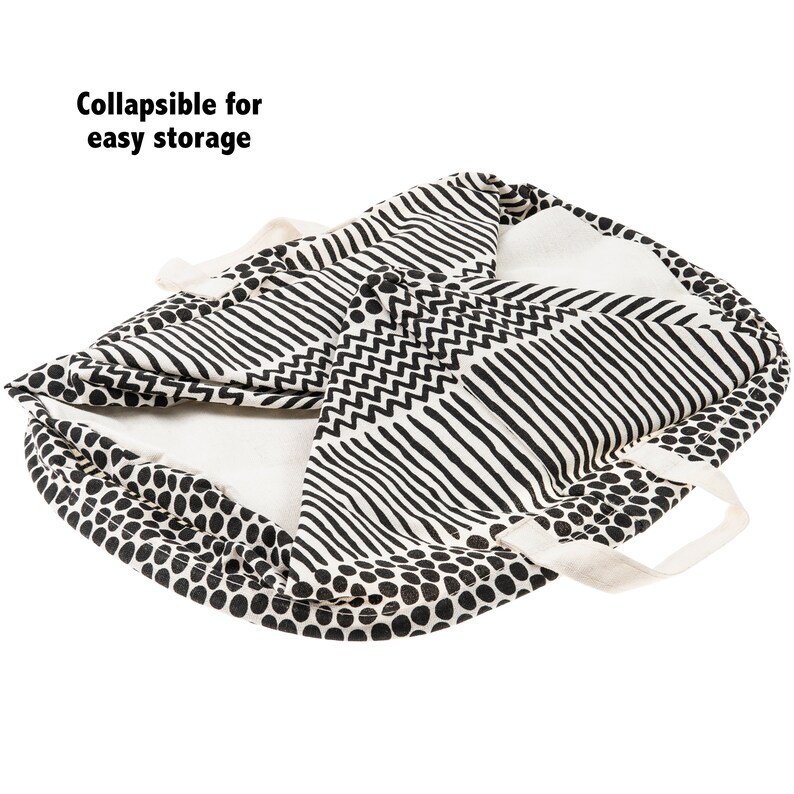 May include: A black and white patterned fabric storage basket with handles. The basket is folded and the text "Collapsible for easy storage" is visible.