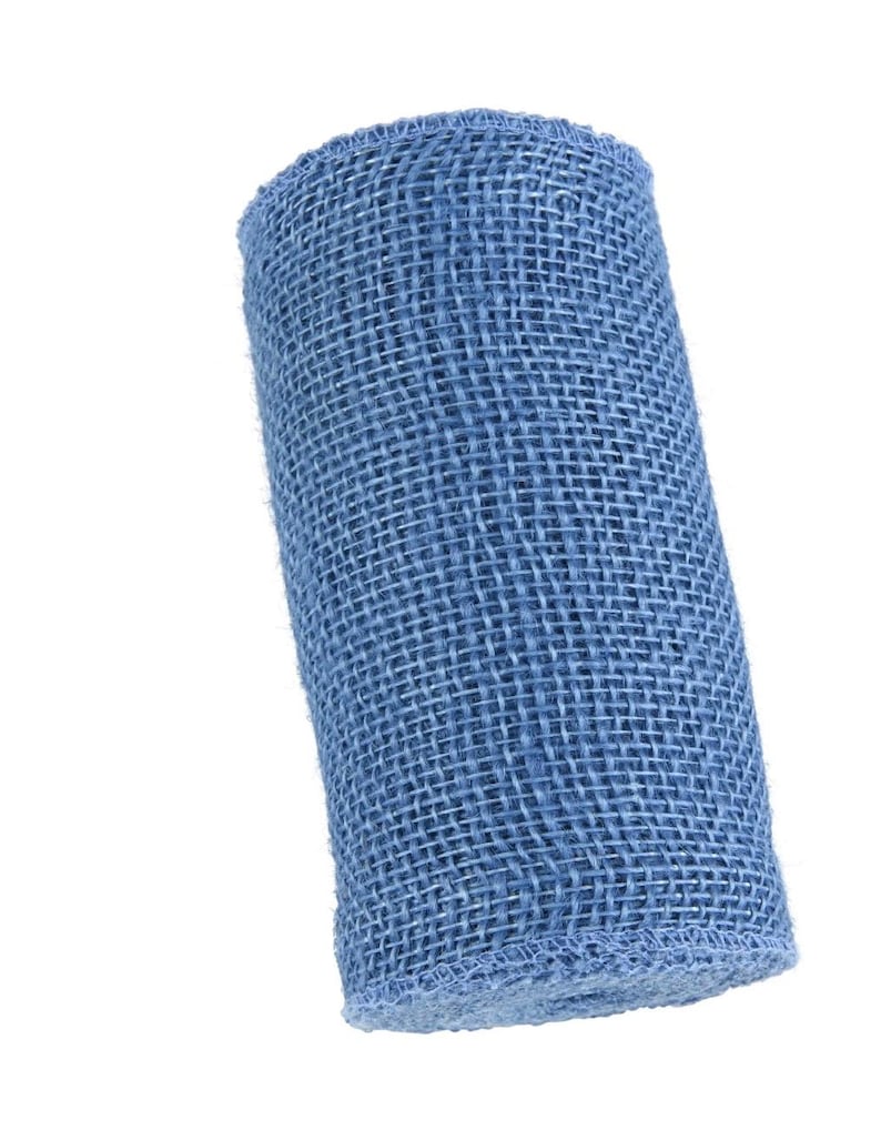 May include: A roll of blue burlap ribbon. The ribbon is woven and has a textured surface.