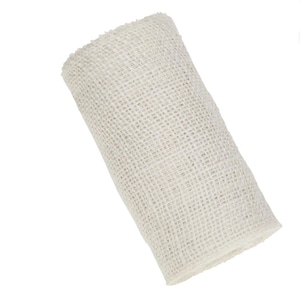 May include: A roll of white hessian ribbon. The ribbon is made from a natural fibre and has a rough texture.