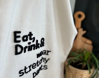 Galia Tasarim - Embroidered Decorative Linen Kitchen Towel with 'Eat, Drink, Wear Stretchy Pants