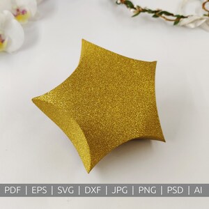 May include: A gold glitter star-shaped box, perfect for packaging small gifts or favors.