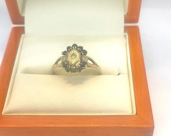 A beautiful Antique 9ct Gold Sapphire and Diamond Cluster Design