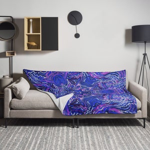 Manta con tacto de seda: un detalle acogedor y elegante para el hogar