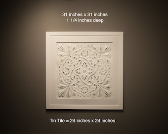 Salvaged church white tin ceiling tile with an ornate vintage pattern