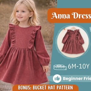 Op de afbeelding: Een roodbruine corduroy jurk met lange mouwen en ruches. De jurk wordt getoond op een jong kind. De afbeelding bevat de tekst "Anna Dress", "Back View", "6M-10Y", "Beginner Friendly" en "BONUS: BUCKET HAT PATTERN".