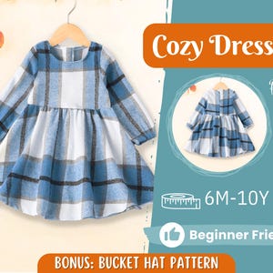 May include: A blue and white plaid long-sleeved dress with a gathered skirt. The dress is labeled "Cozy Dress" and has a "Back View" image. The size range is 6M-10Y and it is labeled "Beginner Friendly". The image also includes the text "BONUS: BUCKET HAT PATTERN".