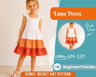 May include: A tiered dress featuring a white bodice, an orange middle section, and a dark orange hem. The dress has flutter sleeves and a square neckline. Text includes Luna Dress, Back View, 6M-10Y, Beginner Friendly, and BONUS: BUCKET HAT PATTERN.