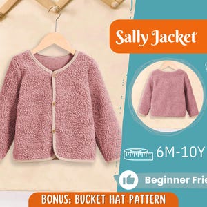 May include: A dusty rose-colored jacket with a textured, fuzzy exterior, hanging on a wooden hanger. The jacket has a rounded neckline and is buttoned up. The image also includes the text "Sally Jacket", "Back View", "6M-10Y", and "Beginner Friendly".