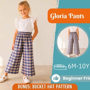 May include: A young girl wearing a white top with ruffled sleeves and plaid pants. The pants are blue, beige, and red, with a wide-leg design. The image includes text that says "Gloria Pants", "Back View", "6M-10Y", and "Beginner Friendly".