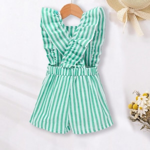 May include: A green and white striped sleeveless romper with a ruffled neckline and a criss-cross back.