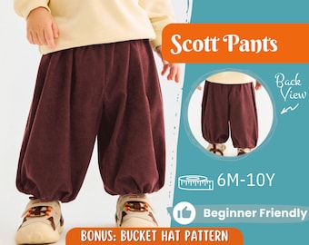 May include: A pair of brown corduroy pants with a gathered elastic waistband. The pants are shown on a child model wearing a cream colored sweater. The text "Scott Pants" is displayed in a large font above the model. The text "6M-10Y" is displayed in a smaller font below the model. The text "Beginner Friendly" is displayed in a smaller font below the model. The text "Bonus: Bucket Hat Pattern" is displayed in a smaller font below the model.