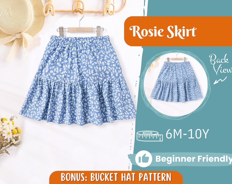 May include: A blue and white floral skirt with a ruffled hem. The skirt is labelled "Rosie Skirt" and is available in sizes 6M-10Y. The text "Beginner Friendly" is also included in the image.