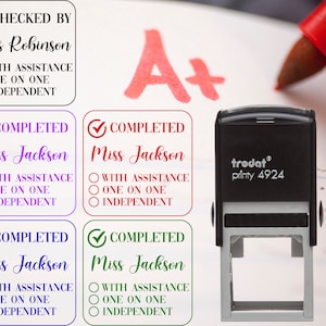 May include: Four red, purple, green, and red rubber stamps with the text "COMPLETED" and "Miss Jackson" and tick marks. The stamps also have options for "WITH ASSISTANCE", "ONE ON ONE", and "INDEPENDENT". A black rubber stamp with the text "trodat printy 4924" is also shown.
