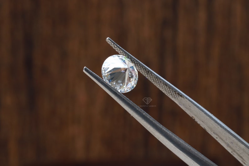 A well-proportioned 1.00ct round lab-grown diamond at 6.5mm shown on the finger.
This iconic carat weight is the most popular for engagement rings.
Its sparkle, clarity, and perfect proportions make it a classic centerpiece.
Crafted for brilliance and backed by certification.