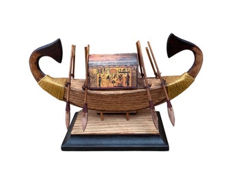 A wonderful hand-made pharaonic boat made of wood, made in Egypt.