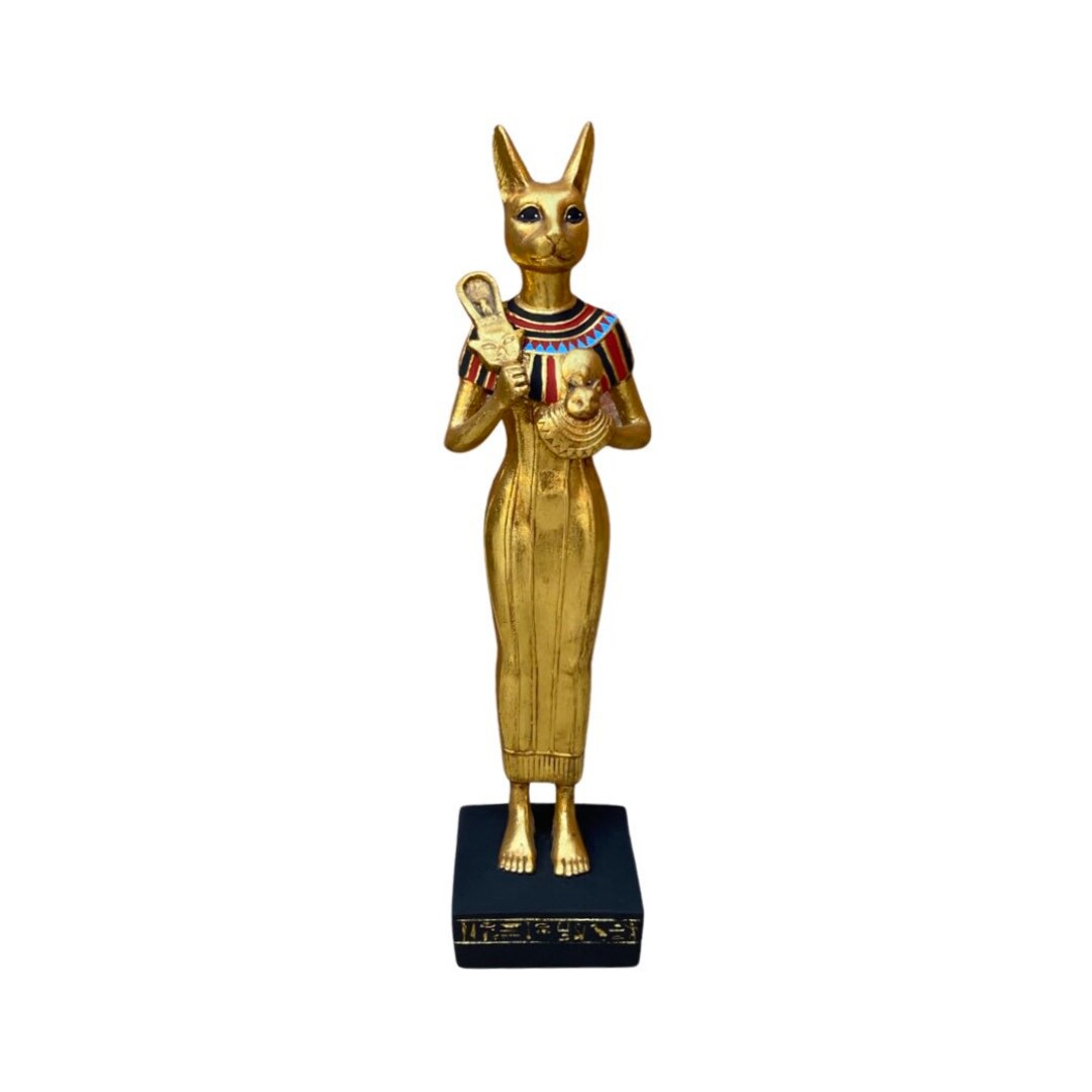 A Unique Statue of Bastet in the Form of a Human Body, Holding in Her