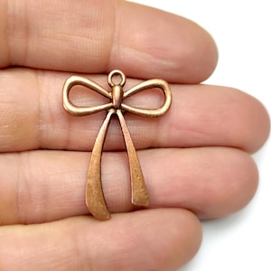 2 Vintage bow charm pendant Antique copper plated charms 33x25mm HNF1044