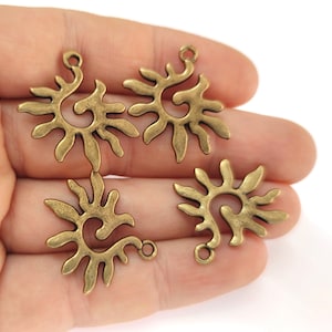 4 Sun charms Antique bronze plated charms 27x27mm HNF887