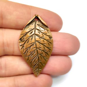 Pendentif à breloques 2 feuilles Charms plaqués cuivre antique 44 x 24 mm HNF1116