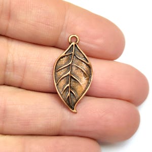 4 breloques Feuilles breloques plaquées cuivre antique 28 x 14 mm HNF1218