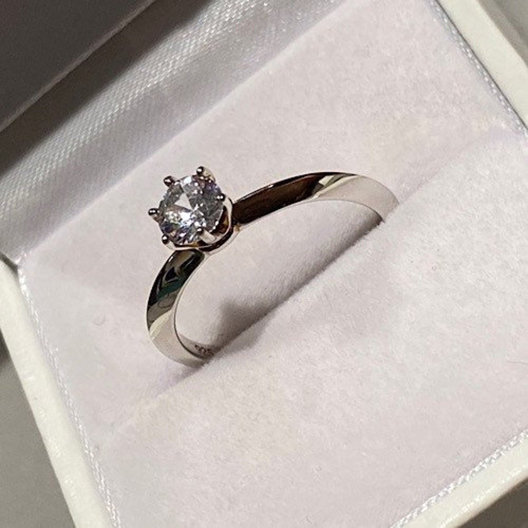 Rhodium Plated Solitaire Rectangle CZ Ring with Halo CZ Edge