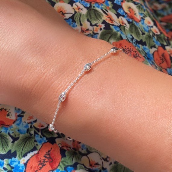 Thin silver bracelet with charm deals