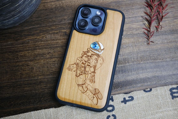 Celestial Explorer: The Floating Astronaut. Hand-Inlaid Wood & Mother of Pearl Case - Artisanal Cover for iPhone, Galaxy and Pixel