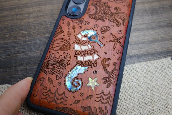 Seahorse Serenade: An Aquatic Symphony, Hand-Inlaid Wood & Mother of Pearl Case - Artisanal Cover for iPhone, Galaxy and Pixel