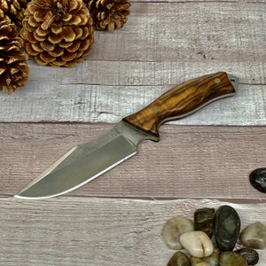 Hunting Knife made by Walnut Wood Handle and N690 German Bohler Steel, comes with Leather Sheath and Ferro Rod