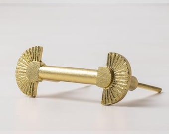 May include: Gold metal towel bar with a fan-shaped design on each end.