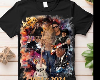 May include: Black t-shirt with a colorful graphic of musicians playing instruments. The graphic includes the text "200 Jackson St." and "1953-2024".