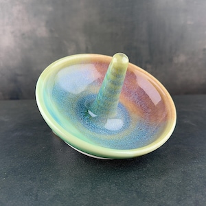Handmade ceramic ring holder featuring flowing glaze and natural color variation, pottery jewelry holder with glossy surface and unique finish. Pictured here Ocean Sunset glaze option.